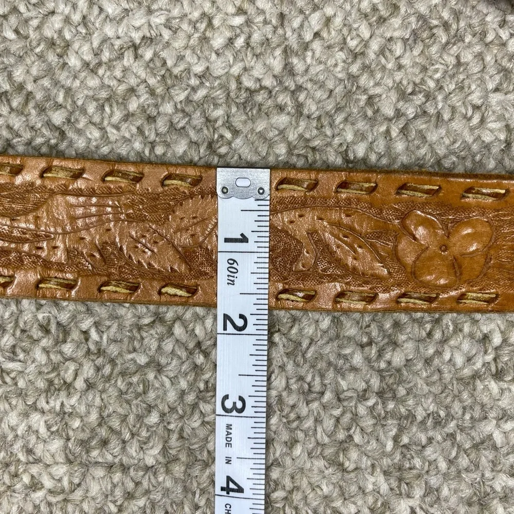 Cowboy belt buckle and leather belt